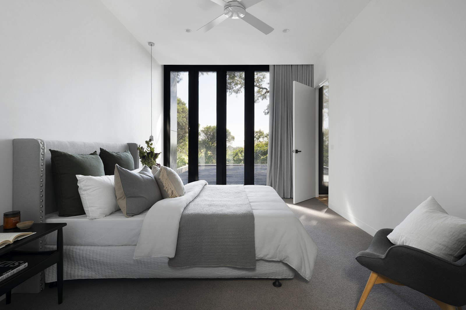 Quiet renovated interior used as a meeting backdrop of light and plaster